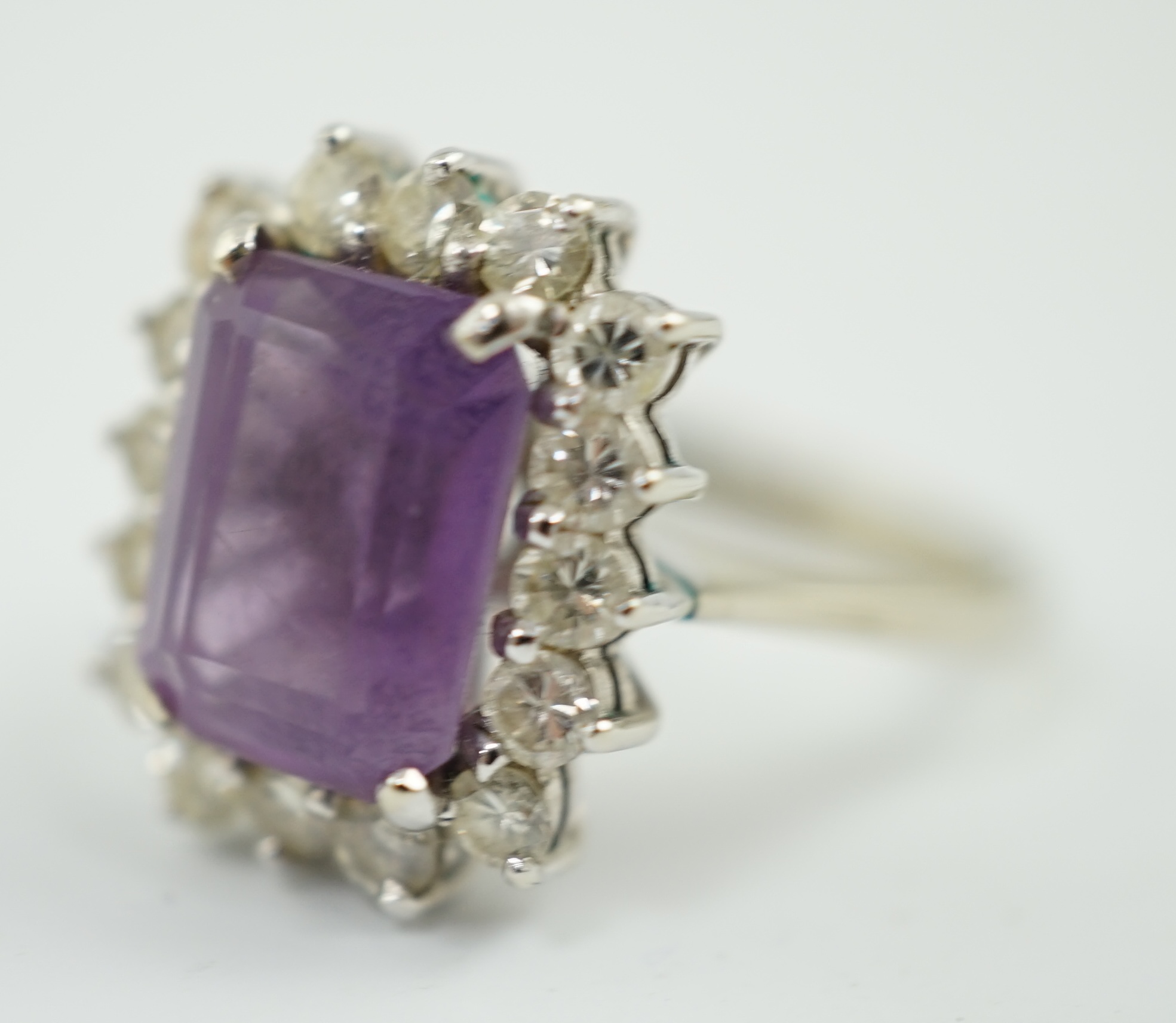 A modern white gold, amethyst and diamond set rectangular cluster ring